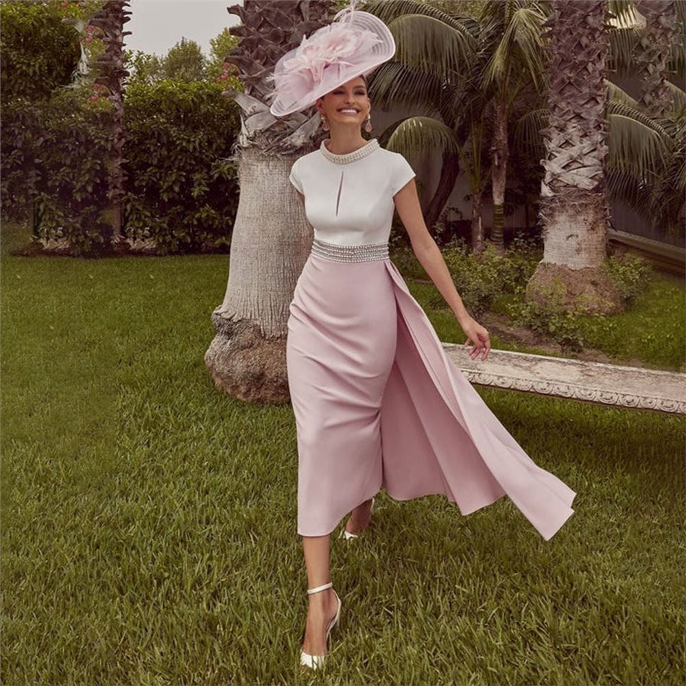 Veni Infantino 992415 Ivory & Rose Peal Waist Dress With Fitted Skirt And Overskirt.